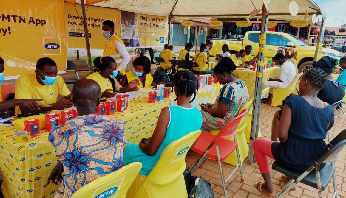 Customers registering their SIM cards at Temporary Registration point at Madina market in Accra