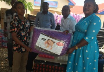Amansie Central former DCE supports 50 form One SHS students with prospectus items