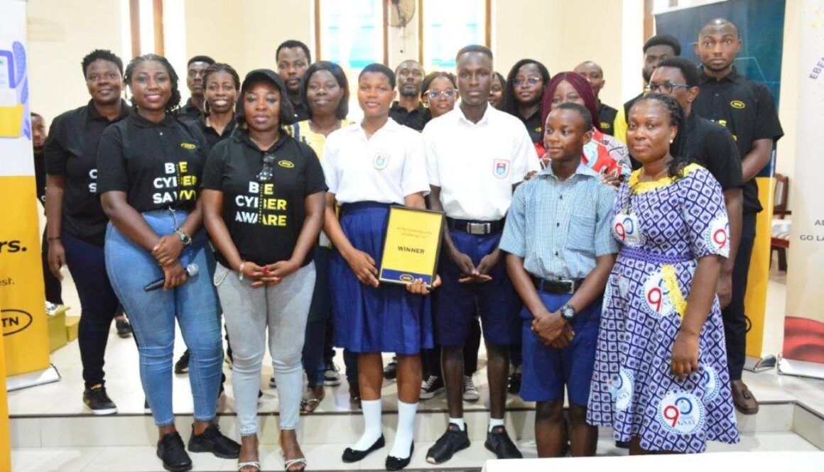 MTN Team in a group picture with the debaters and some teachers at the Osu Presby Senior High School