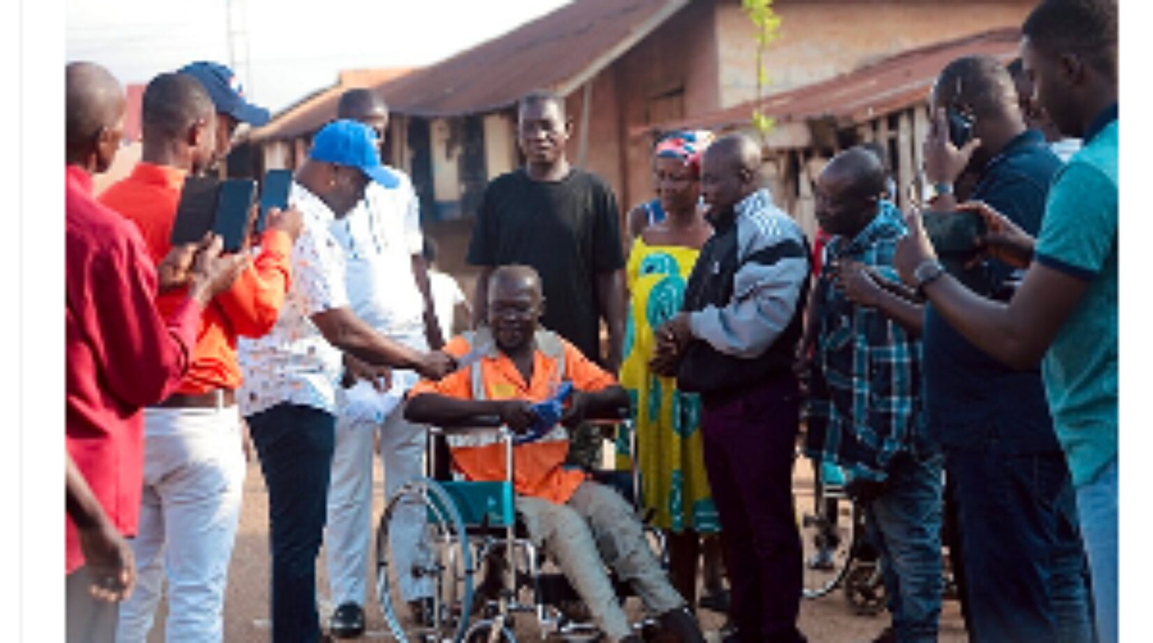 COKA shows love to physically Challenged man in Offinso South,donates brand new Wheelchair, Cash to him