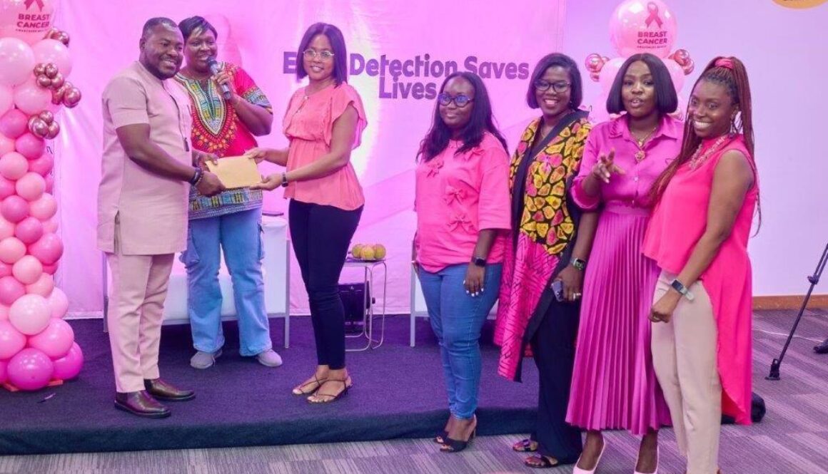 email1731082709035Acting Chief Human Resource Officer, Abdallah Ibrahim receiving the donation from MTN Women In Technology during Breast Canc
