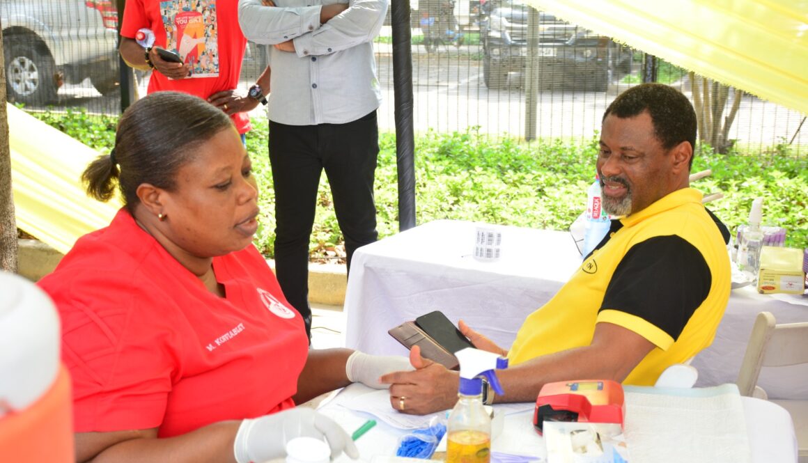 Robert Kuzoe Senior Manager for MTN Ghana Foundation preparing to donate blood during MTN Save a Life Campaign