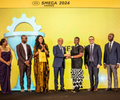 Shri Manish Gupta, India’s High Commissioner to Ghana presenting a plaque to the Yesli Ice CEO, Best SME of the Year